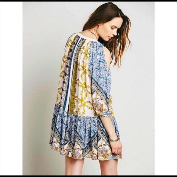 Free People Dresses & Skirts - Free people patterned swing dress. Long/quarter sleeved cold shoulder